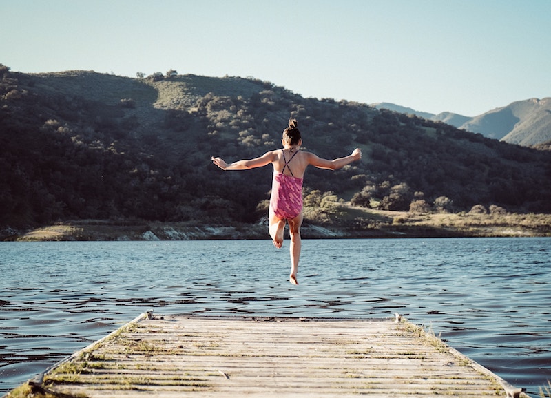 Fear of failure woman jumping