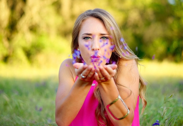 Women blowing flowers nice